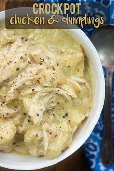 a white bowl filled with chicken and dumplings