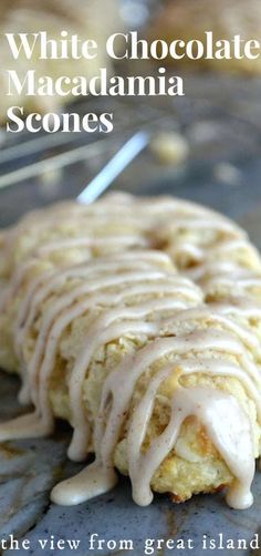 white chocolate macadamia scones are drizzled with icing