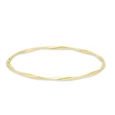 Graceful and elegant, this fashion bangle bracelet is a great day or evening wardrobe choice. Crafted in warm 14K gold, this polished design is gently twisted for a shimmering look. Wear two or more together for a bohemian chic look. Buffed to a bril Formal Flexible Yellow Gold Bangle, Flexible Yellow Gold Bangle For Formal Occasions, Elegant 14k Yellow Gold Bangle, Elegant Adjustable Hoop Gold Bracelet, Yellow Gold Flexible Bangle Bracelet, Flexible Yellow Gold Bangle Bracelets, Elegant Adjustable Yellow Gold Bangle, Adjustable Yellow Gold Elegant Bangle, Adjustable Yellow Gold Bracelets With A Modern Twist