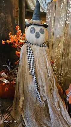 a scarecrow made out of burlock and fabric