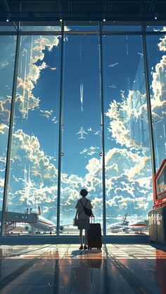 a person standing in an airport looking out the window at planes flying through the sky