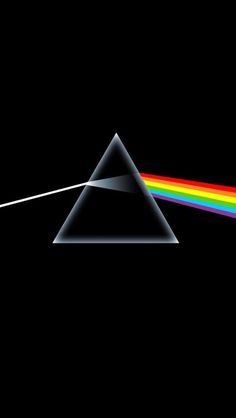 the dark side of the moon with a rainbow colored light coming from it's end