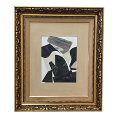 an abstract black and white painting in a gold frame