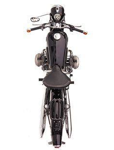 the front view of a black motorcycle on a white background