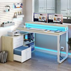 a computer desk with two monitors on top of it and some drawers underneath the desk