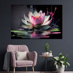 a large pink flower sitting on top of a table next to a chair and potted plant