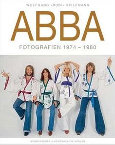 the cover of abba magazine shows four women in white and blue outfits with their arms up