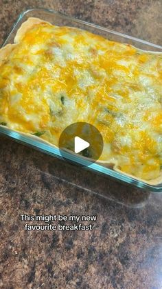 a casserole dish sitting on top of a counter next to a glass container