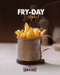 french fries in a metal cup with the words fry - day on it