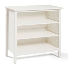 a white book shelf with three shelves on each side