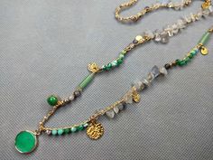 Limited edition collection of 5 necklaces with mix of charms made of jade, magnesite, real gold plated stainless steel. The rich emerald green color  is combined with mysterious labradorite, agate, jade and glass crystals and 18k golden plated charms. Length 70 cm.  Carefully hand knitting in my atelier in the suburbs of Paris. Crochet Boho, Long Beaded Necklace, Boho Crochet, Boho Stil, Coin Pendant, Real Gold, Boho Style, Labradorite, Hand Knitting