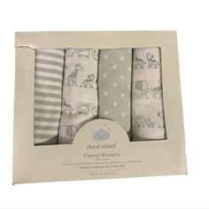 four baby blankets are in a box with the packaging on it's front and back