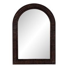 a mirror that is sitting on top of a wooden frame with an oval shaped border around it