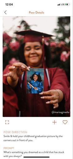 a woman in graduation cap and gown holding up a photo