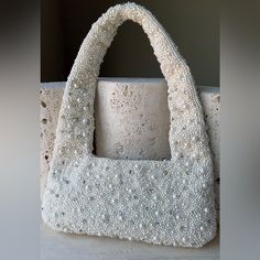 Elevate Your Style With This Stunning Modern Pearl Handbag. This Bag Is Entirely Covered With Intricately Placed Pearls And Unique Crystal Detailing Embellishments. This Bag Is So Versatile With Sophistication And Elegance, Perfect For A Bride, Cocktail Party Or Add Luxury To Your Everyday Casual Look. Top Zipper Closure Size: From Top Of Strap To Bottom Of Purse 12.5 In Across 9.5 In Bride, Mom, Makeup, Cosmetics, Cosmetic Bag, Mother, Nana, Baby, Kids, Gift For Her, Bridal Gift, Travel Bag, Tr Bride Handbag For Wedding Day, Cream Shoulder Bag With Pearl Handle For Shopping, Luxury Embellished Cream Bags, White Embellished Bag For Everyday Use, Elegant Beaded Tote Shoulder Bag, Elegant Beaded Tote Bag, Cream Rectangular Bag With Pearl Embroidery, White Embellished Rectangular Bag, White Embellished Rectangular Bags