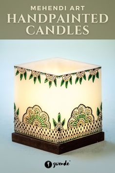 the cover of mehndi art handpainted candles, featuring an intricate design