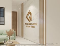 a living room filled with furniture and a wall mounted sign that reads, reinehmed arden dental clinic