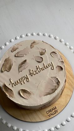 a birthday cake with the words happy birthday on it