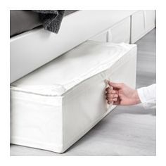 IKEA - SKUBB, Storage case, white, , You can even keep the storage case under the bed – perfect for extra bed linens, pillows or covers.Protects your clothes and bed linen from dust.Easy to pull out as the storage case has a handle on the side.Your stored clothes and textiles stay fresh longer, as ventilation nets in the corners allow air to circulate.When you don’t need the storage case and want to save space, simply open the hook and loop fasteners on the sides and fold it flat. Ikea Skubb, Comforter Storage, Pillow Storage, Pax Wardrobe, Bed Linen Design, White Linen Bedding, Ikea Storage, Linen Storage, Plastic Box Storage