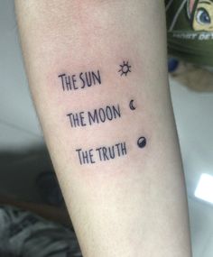 the sun, the moon and the truth tattoo on someone's arm