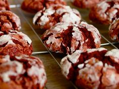 some red velvet cookies are cooling on a rack