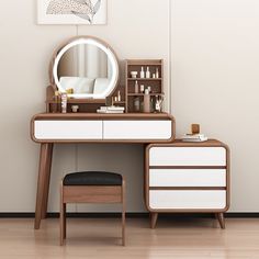 a dressing table with a mirror and stool next to it