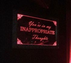 a neon sign that says you're in my inappropriate thoughts