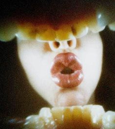 a close up of a person's mouth and tongue