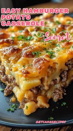 a close up of a slice of food on a plate with the words easy hamburger casserole secret