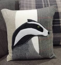 the badger pillow has been made to look like it's in an animal print