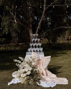 a bouquet of white flowers sitting on top of a table