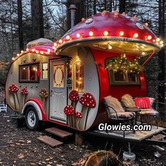 a red and silver trailer with lights on it