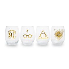 harry potter glasses are lined up on a white background, with gold lettering and symbols