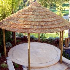 a gazebo in the middle of a garden