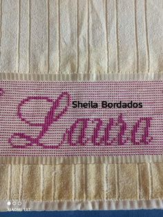 the label for sheila bordados's name is shown in pink and white