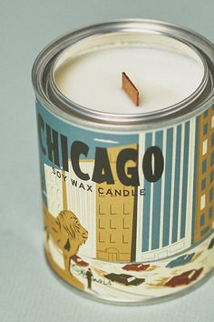 a chicago city wax candle in a tin