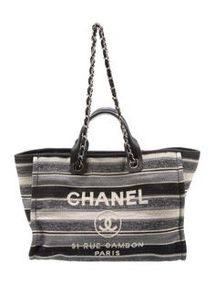 Chanel ToteFrom the 2018 Collection by Karl LagerfeldGreyInterlocking CC Logo, Chain-Link Accent & Tweed PatternSilver-Tone HardwareLeather TrimFlat Handles & Chain-Link Shoulder StrapsLeather Trim EmbellishmentCanvas Lining & Three Interior PocketsSnap Closure at TopIncludes Dust Bag Chanel Patern, New Chanel Bags, Chanel Canvas, Chanel Tote, Burberry Handbags, Canvas Shopping Bag, Chanel Deauville Tote Bag, Shopper Tote, Shopping Tote