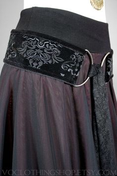 "** NEW ITEM ** BLACK EMBOSSED VELVET tie-front hip belt with BLACK VELVET TRIM, big gunmetal d-rings, extra long lace scarf, and heavy duty corset elastic backing. 100% handmade and animal friendly! WINE + CHAMPAGNE OMBRÉ SKIRT: https://www.etsy.com/listing/875709715/ SIZES + BELT LENGTHS: XS :: 29\" S :: 32\" M :: 35\" L :: 38\" XL :: 41\" XXL (2X) :: 45\" FOR AN IDEAL FIT, your belt length should measure a few inches smaller than your full hips: the widest part of your lower body. All orders Diy Goth Outfits, Embossed Clothing, Gothic Belt, Goth Belt, Witchy Clothes, Embossed Velvet, Lace Belt, Velvet Tie, Handmade Belts