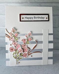 a birthday card with flowers on it