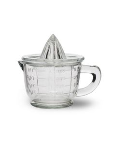 a glass measuring cup on a white background