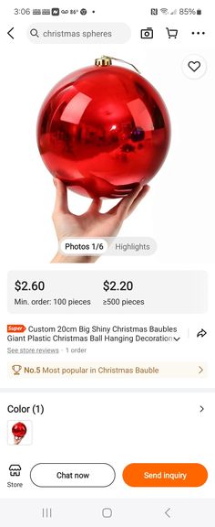 a red christmas ornament is on sale for $ 2, 200 in stores