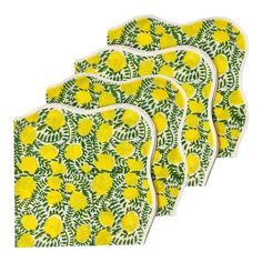 four yellow lemons and green leaves coasters on a white background, set of 4