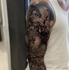 a man with an owl tattoo on his arm