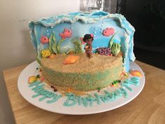 there is a cake that looks like it has been made to look like the little mermaid