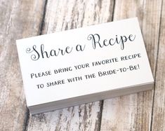 a white business card with the words sharea recipe written in black ink on it