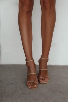 Most definitely a prerequisite in every closet, a good pair of strappy block heels can transform any outfit. These versatile heels are comfy, timeless and still oh so cute. Graduation Heels, Block High Heels, Heels Block, Trending Womens Shoes, Neutral Heels, Nude High Heels, Clothing Aesthetic, Strappy Block Heels, Short Heels