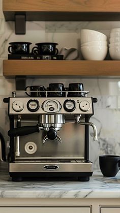 an espresso machine sitting on top of a counter