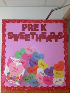 a sign that says pre k sweethearts hanging from the ceiling with hearts on it