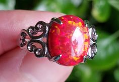 Fantastic Red Fire Opal Set in Ornate Sterling Ring. Large Lab Created Stone 10x12mm is Radiating Depth and Fire! Adjustable Size, I Will Adjust It For Your Desired Size Between 6-9.5 Great Gift! Black Opal Ring, Fire Opal Ring, Red Band, Green Opal, Opal Ring, Red Fire, Black Opal, Victorian Style, Opal Rings