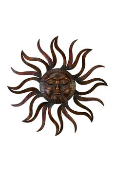 a metal sun face with the words home and garden essentials